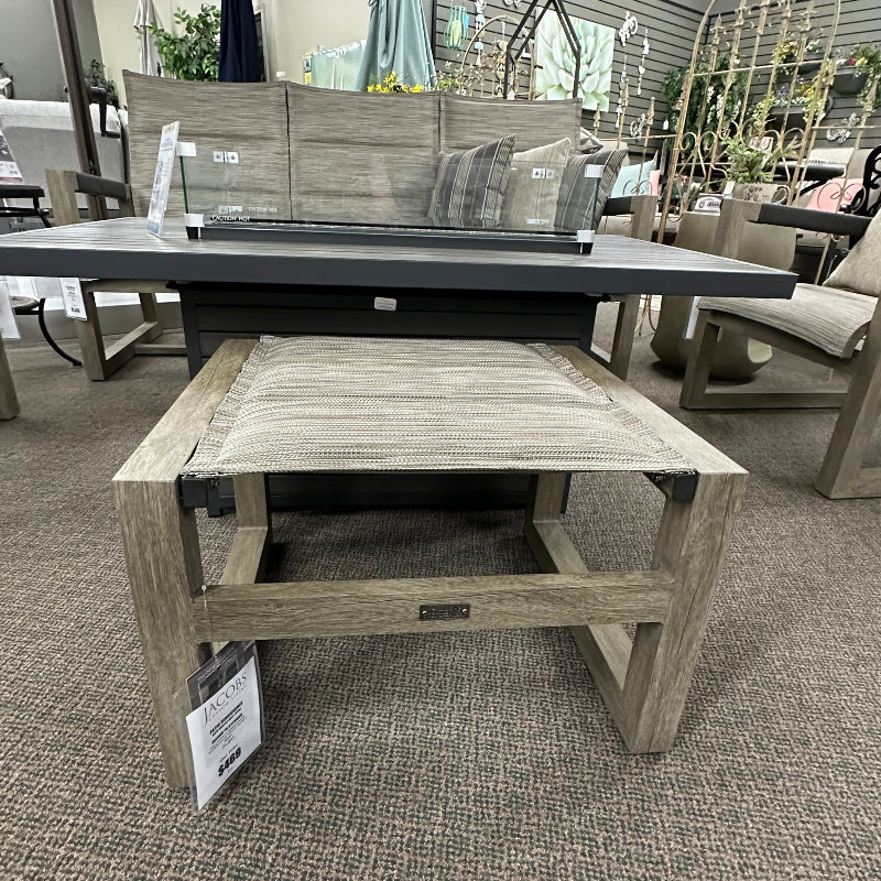 Wooden coffee table with a price tag in an indoor setting
