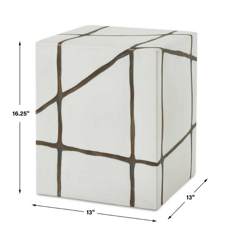 Cube-shaped ottoman with brown line pattern and dimensions on a white background