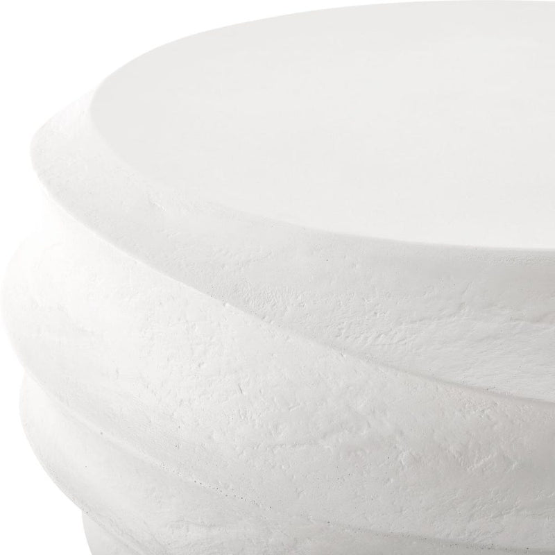 Close-up of a white textured bowl on a white background