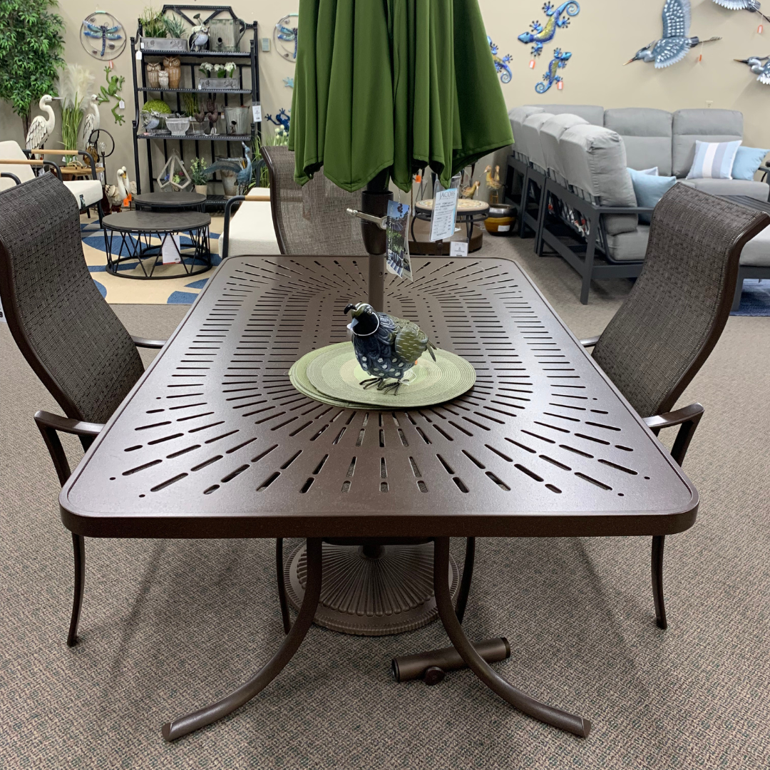 The Tropitone La Stratta 48" Umbrella Dining Table" is available in our Jacobs Custom Living Spokane Valley showroom.