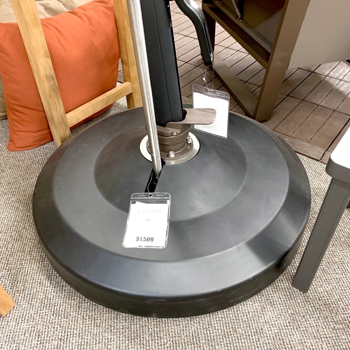 Oasis Rolling Base 330lb Zinc Plated Round Umbrella Base 330R-04 is available in our Jacobs Custom Living Spokane Valley showroom.