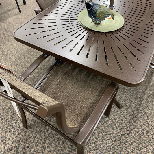 The Tropitone La Stratta 48" Umbrella Dining Table" is available in our Jacobs Custom Living Spokane Valley showroom.