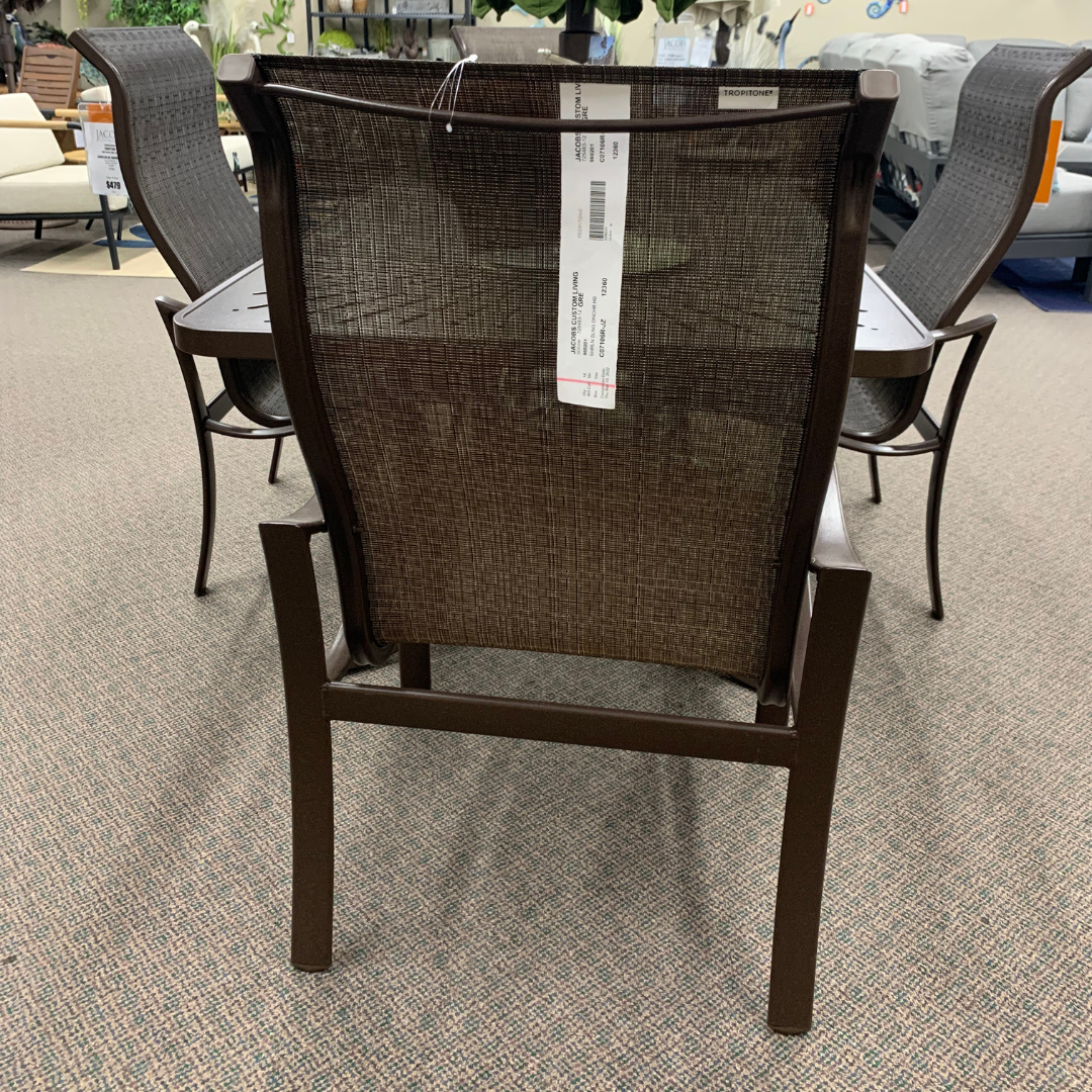 The Tropitone Shoreline High Back Dining Arm Chair is available at Jacobs Custom Living Spokane Valley WA showroom.
