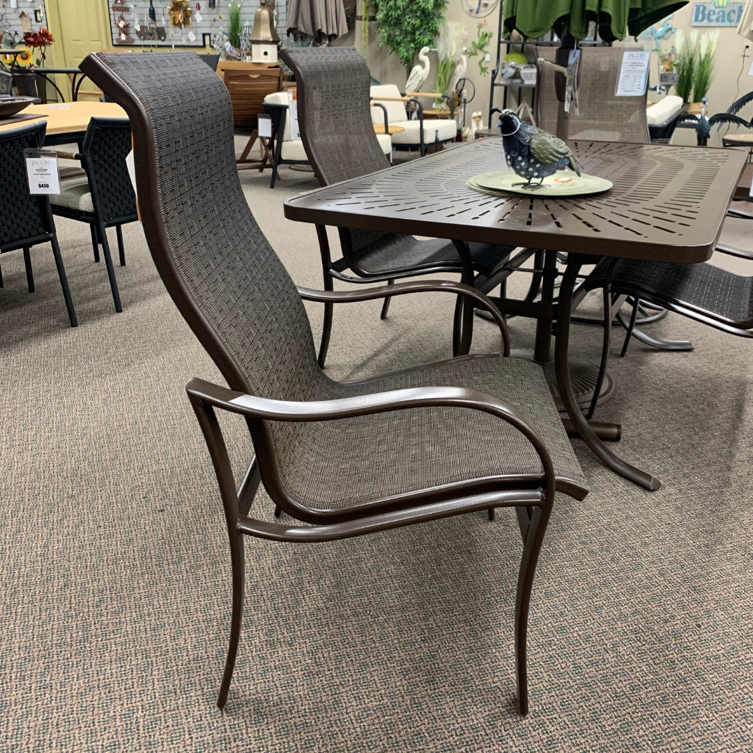 The Tropitone Shoreline High Back Dining Arm Chair is available at Jacobs Custom Living Spokane Valley WA showroom.