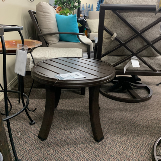 Tropitone Banchetto 24" round tea table with durable aluminum slat-top design. Low-maintenance patio style for everyday outdoor living. In stock now.