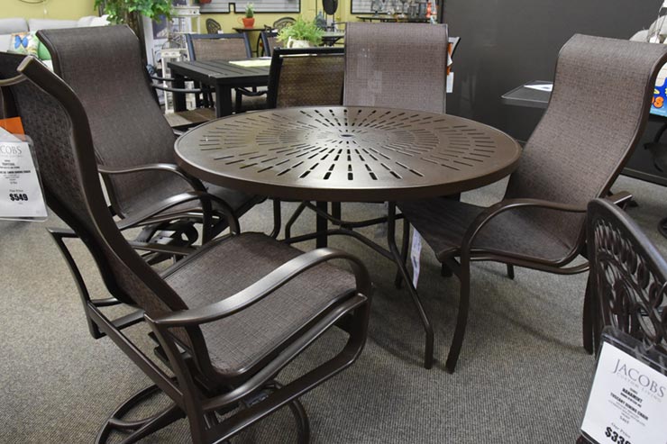 The Tropitone La'Stratta 48" Umbrella Dining Table" is available in our Jacobs Custom Living Spokane Valley showroom.