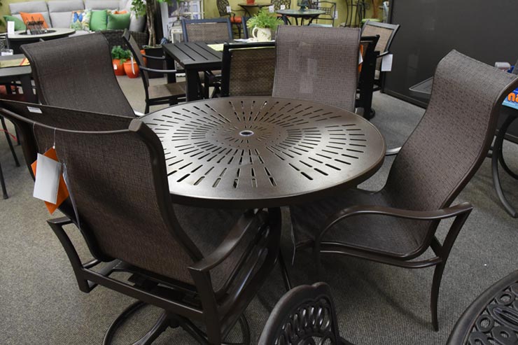 The Tropitone La'Stratta 48" Umbrella Dining Table" is available in our Jacobs Custom Living Spokane Valley showroom.