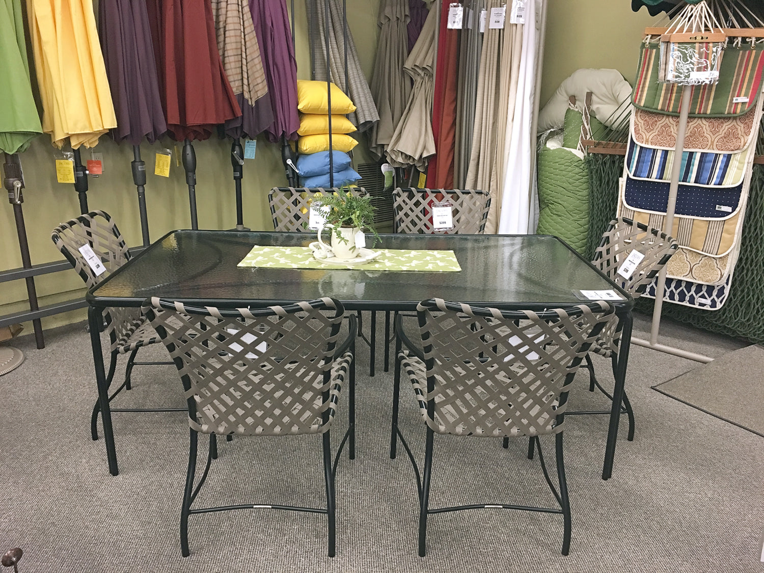 The Brown Jordan Tamiami 43"x77" Glass Top Dining Table is available in our Jacobs Custom Living Spokane Valley showroom.