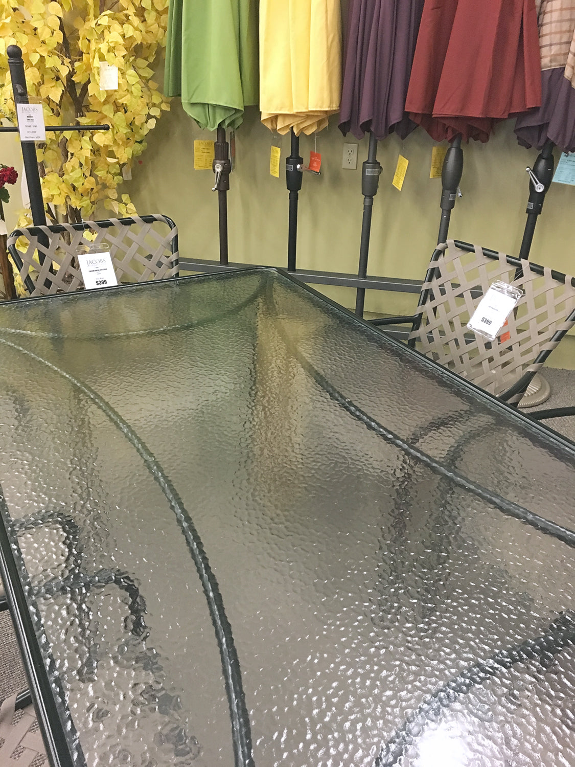 The Brown Jordan Outdoor Tamiami Dining Arm Chair is available in our Jacobs Custom Living Spokane Valley showroom.